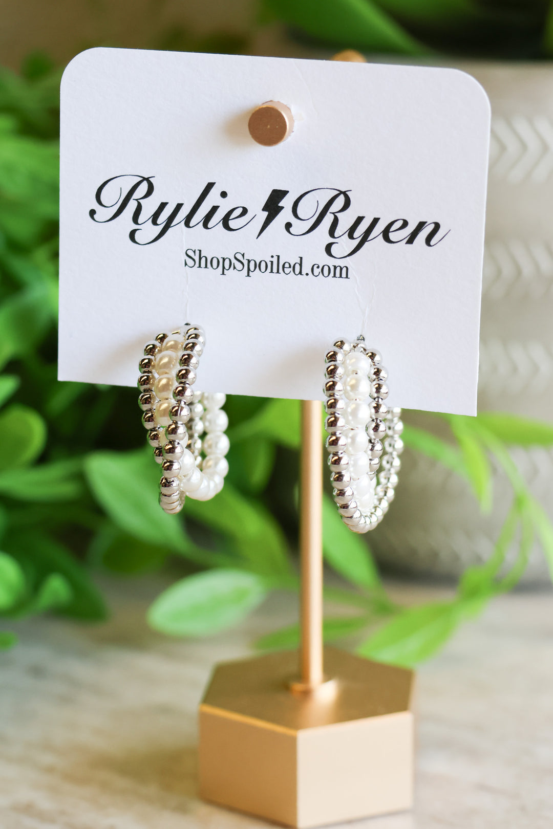 Twisted Love Earring in Silver - ShopSpoiled
